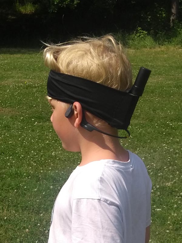 Blind child testing digital guidance with the Nordic Evolution GPS system